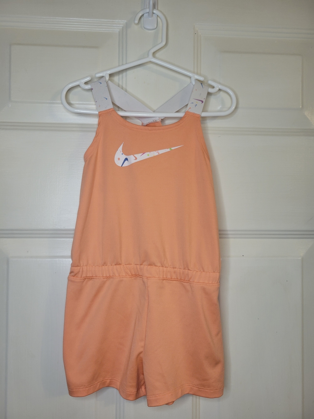 Nike Peach Dri-Fit Girls' Athletic Romper with Printed Swoosh - Picture 2 of 9